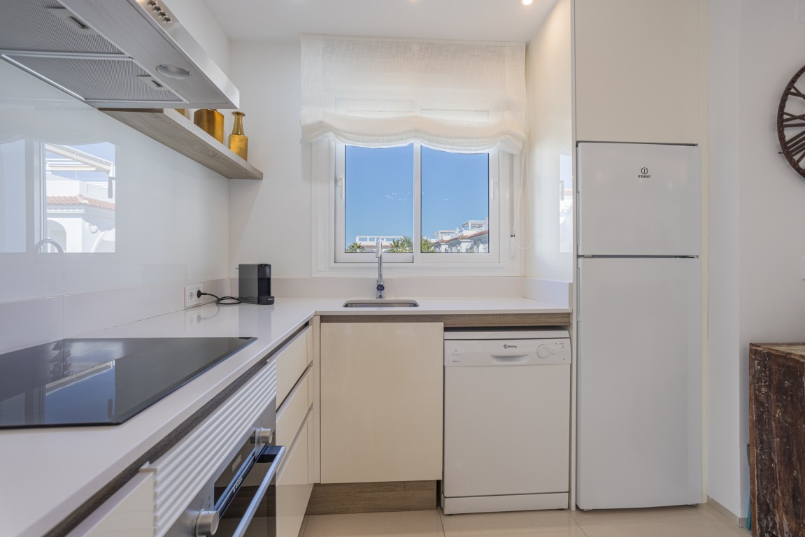 Two Bedroom Penthouse Rojales with Rooftop Terrace and Pool