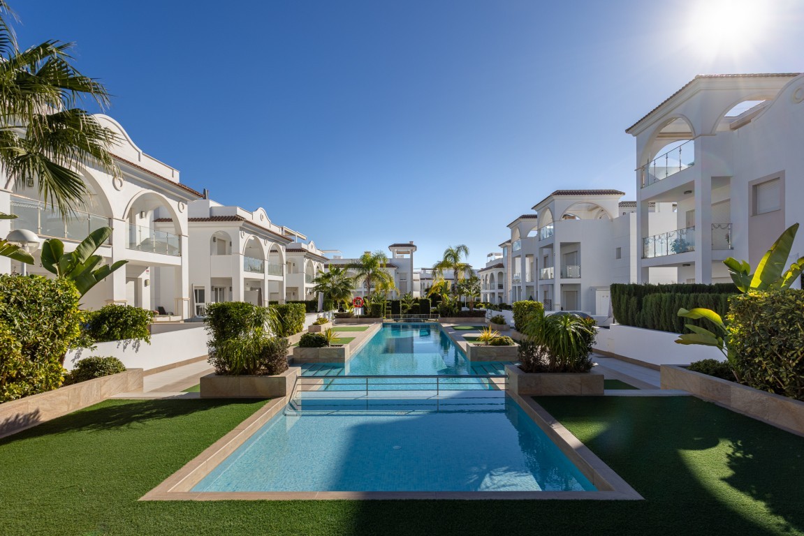 Two Bedroom Penthouse Rojales with Rooftop Terrace and Pool