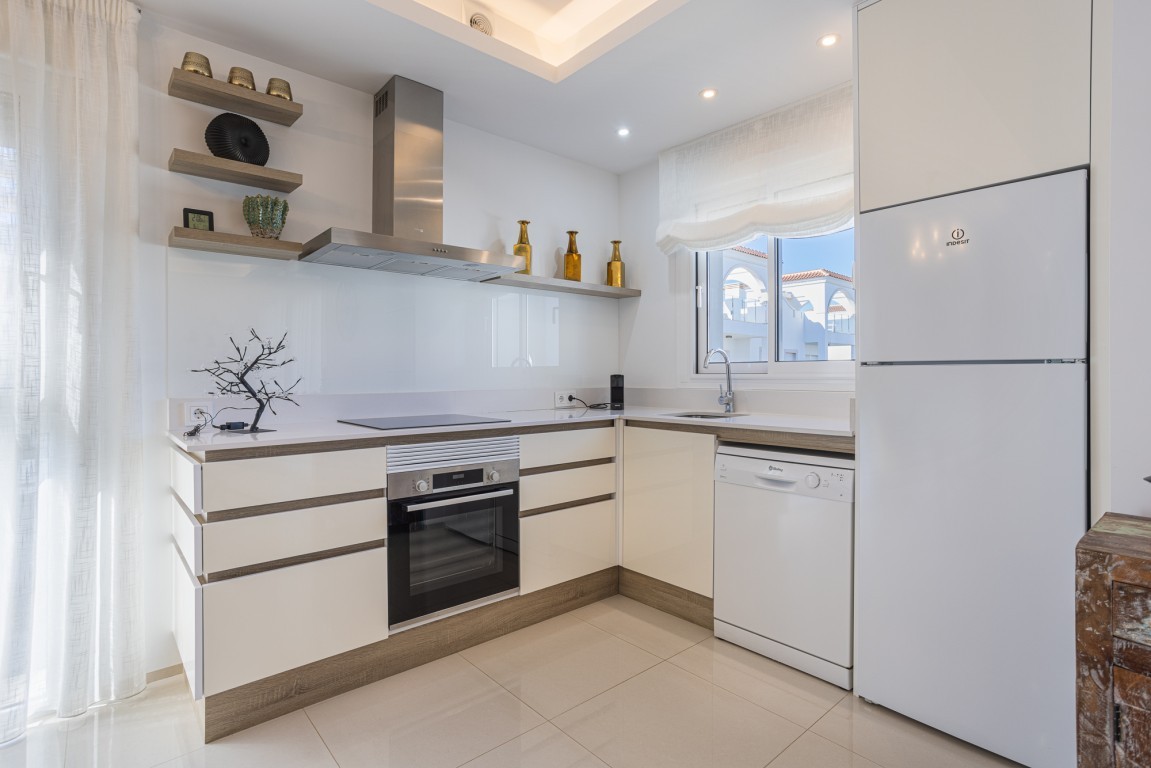Two Bedroom Penthouse Rojales with Rooftop Terrace and Pool