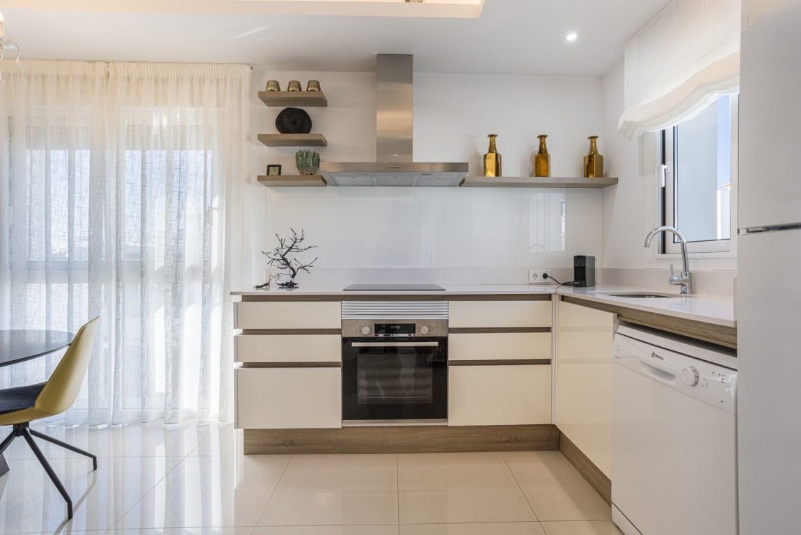 Two Bedroom Penthouse Rojales with Rooftop Terrace and Pool