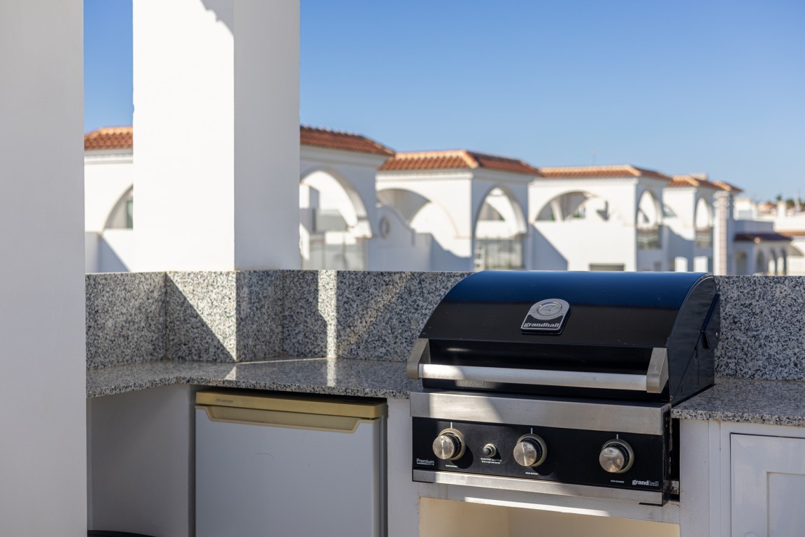 Two Bedroom Penthouse Rojales with Rooftop Terrace and Pool